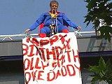 Father mounts cinema roof protest