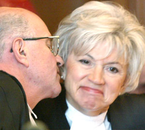 Retiring Supreme Court Justice Frank Iacobucci kisses Chief Justice Beverley McLachlin following a ceremony Monday to mark his retirement at the Supreme Court of Canada. Jonathan Hayward/CP