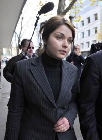 Nazira Rafei leaves court.